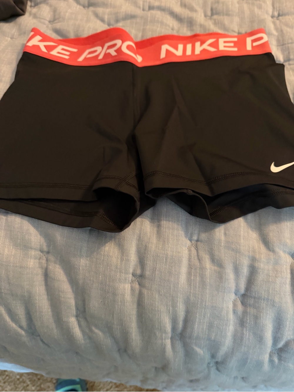 Nike Women's Black Athletic Shorts with Coral Branded Waistband